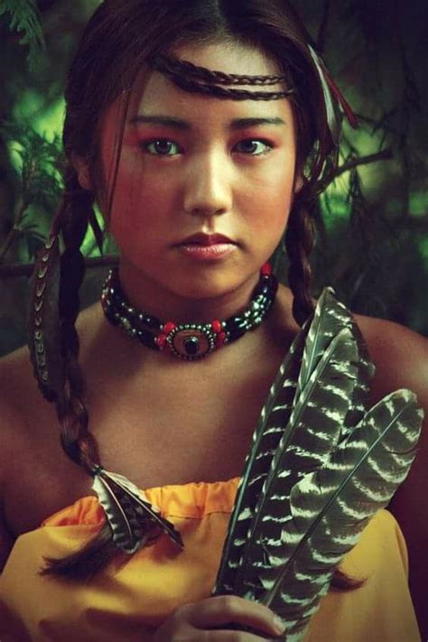 Beautiful Native American Woman With Feather