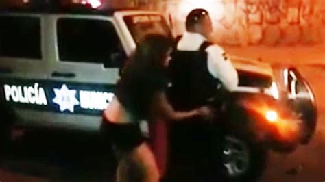 Watch Moment Suspended Police Officer Allows Scantily Dressed Woman To