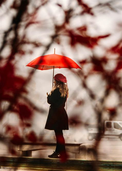 Woman Holding Red Umbrella · Free Stock Photo