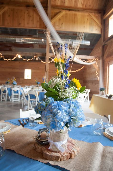 The Blue Hydrangeas In Burlap And Lace Wrapped Mason Jars