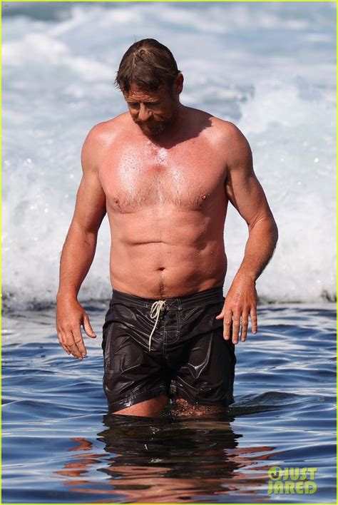 Photo Simon Baker At The Beach With Son Claude Baker 27 Photo 4634062 Just Jared