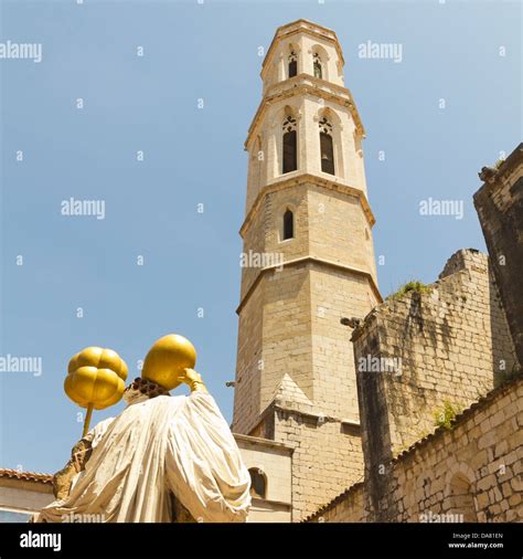 Statue Of Dali Facing The Cathedral In Figueres On June 14 2012 Dali