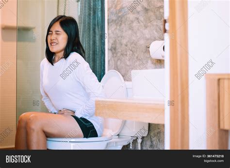 Asian Woman Sufferring Image And Photo Free Trial Bigstock