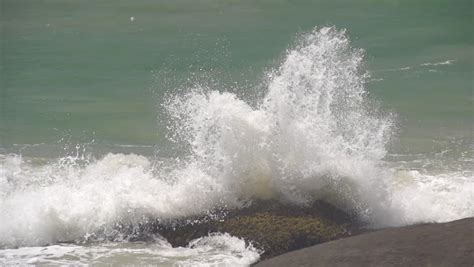 Slow Motion Ocean Waves Hitting Rocks Stock Footage Video 6037427