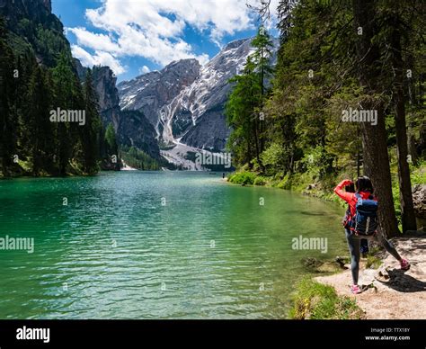 Tourist In Lake Braies Stock Photo Alamy