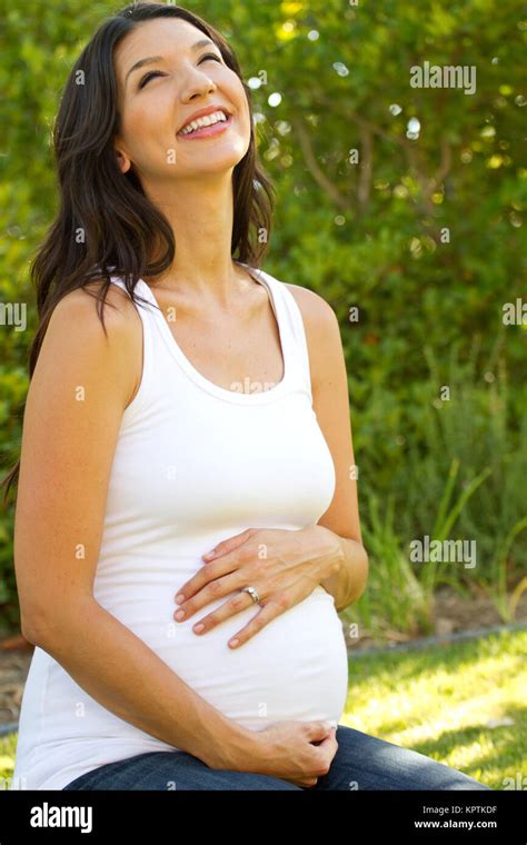 Happy Pregnant Woman Outside In Nature Stock Photo Alamy