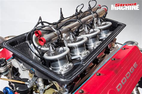 Most fans don't realize how much the same all the cars are. 358CI DODGE NASCAR MOTOR