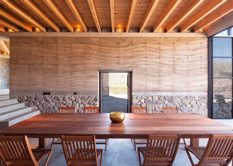 The Cave Is A Gorgeous Rammed Earth Villa That Opens Onto