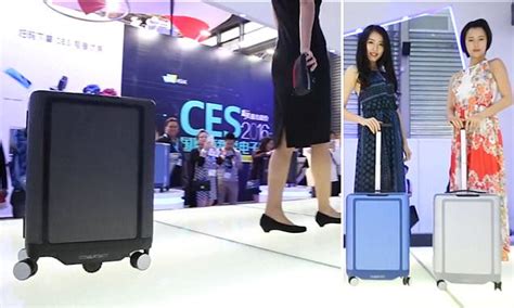 Cowa Robotic Suitcase Follows Its Owner Around The Airport Daily Mail