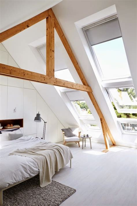 Everything above the bed in this attic bedroom is white and simple. A bright & cozy attic bedroom