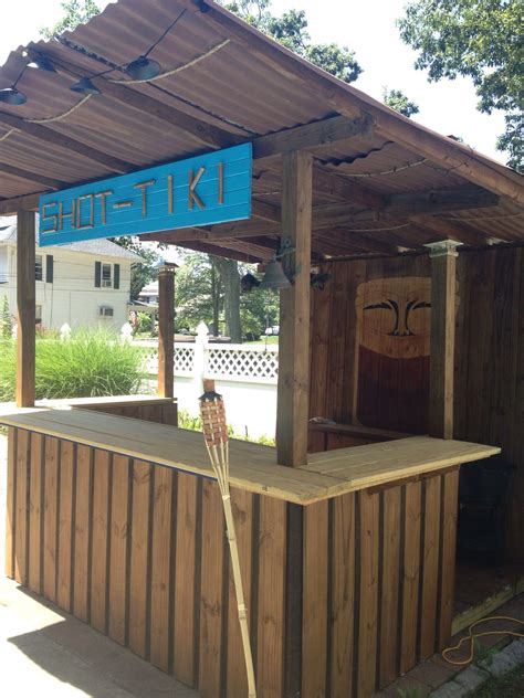 We present the lovely and versatile, kitchen bar table collection.tall, long, seating 2 or 4 comfortably, these gorgeous bar tables can be attached to an existing surface, or freestanding. DIY Tiki Bar my hubby built | Bar para patios, Decoración ...