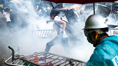 Hong Kong Police Fire Tear Gas At Protesters