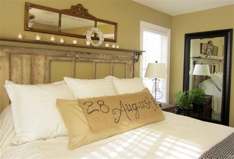 Down to Earth Style: {Vintage, Rustic Master Bedroom} Industrial modern floating shelving from vintage revivals.
