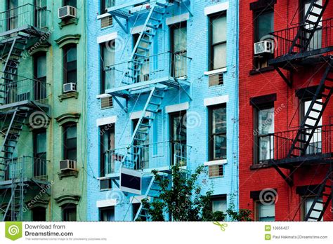 Colorful Apartment Buildings With Fire Escapes Stock Image