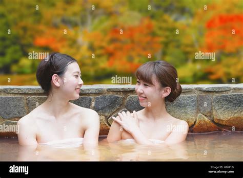Young Japanese Women Bathing At Traditional Onsen Hot