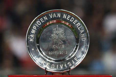 Ajax's players celebrate with the eredivisie trophy. Oranje Wednesdays - The Eredivisie Title Race Heats Up ...