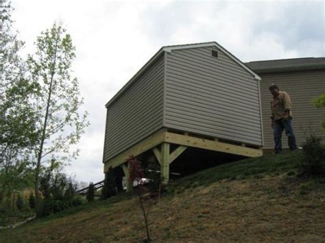 We dug a flat foundation into the slope and built a masonry wall. building a shed on a big slope - The Garage Journal Board ...