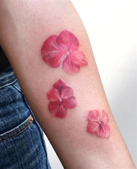 Little Pink Flowers Tattoo Inkstylemag Pink Tattoo Pink Flower