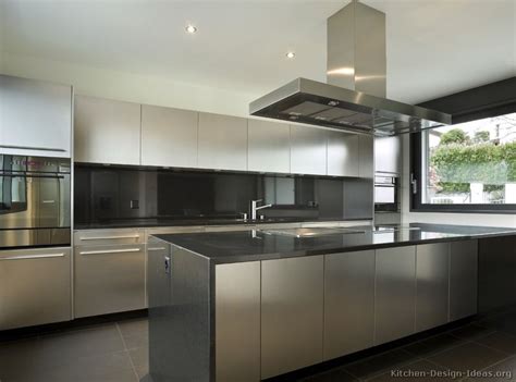 Furthermore, this kitchen blends retro silhouettes with clean modern lines, integrating vintage touches into the apartment. Stainless Steel Kitchen Cabinets with Black Granite ...