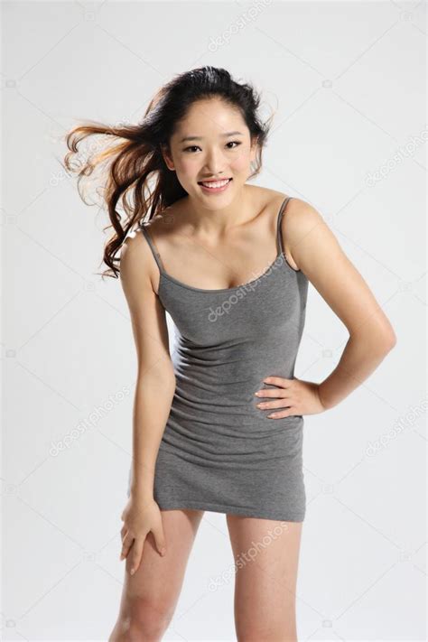 Portrait Of Sexy Asian Woman In Dress — Stock Photo © Viewstock 19315677