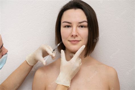 Premium Photo Close Up On Woman During Lip Filler Procedure