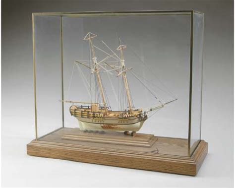 A Model Ship In Glass Case