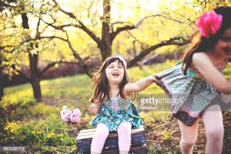 Girl Tugging Skirt Photos Et Images De Collection Getty Images