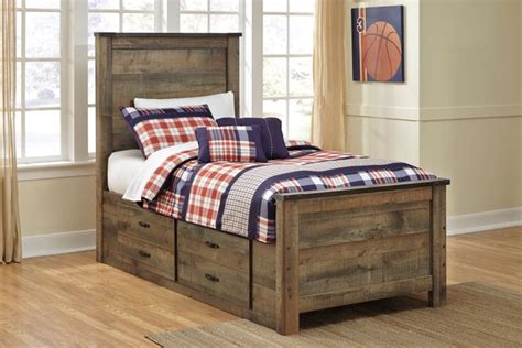 Signature Design By Ashley® Trinell Rustic Brown Panel Bed With With 2