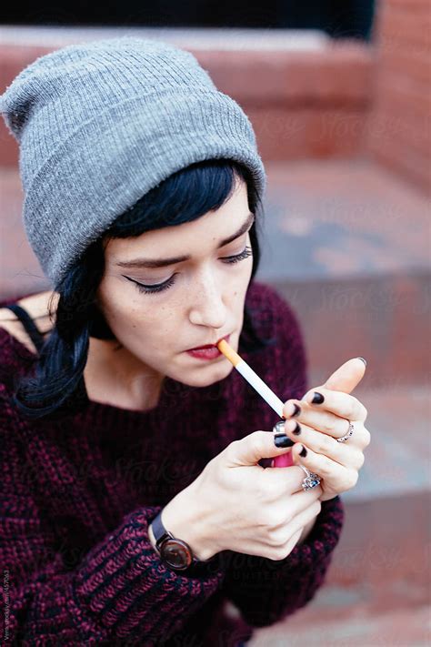 Woman Smoking A Cigarette Del Colaborador De Stocksy Vero Stocksy