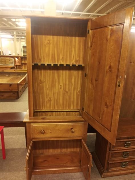 It will securely store your guns, but will also allow you to showcase them as well. PINE GUN CABINET W KEYS | Delmarva Furniture Consignment