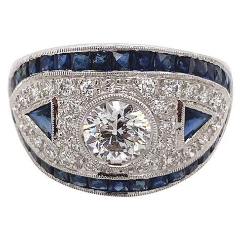 Antique Art Deco 18 Karat White Gold Diamond And Sapphire Shield Ring