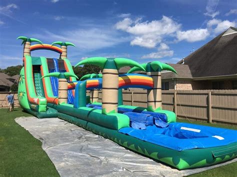 24 Feet Tall Tropical Waterslide With 30 Feet Long Slip And Slide