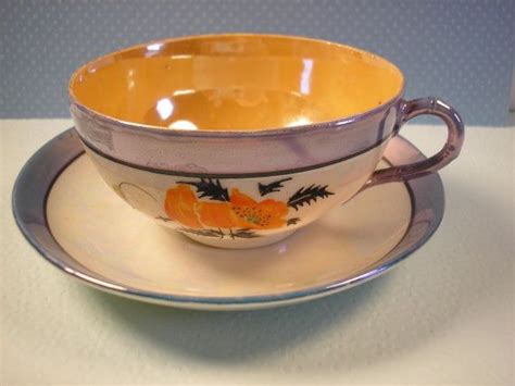 Vintage Luster Ware Tea Cup And Saucer Iridescent Blues Amber Cup Saucer Tea Cups Saucer Cup