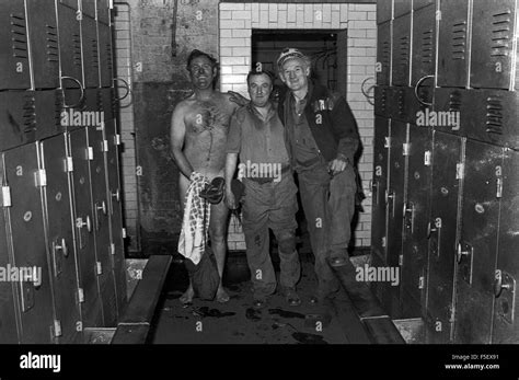 Three Miners In The Pit Head Baths At The Celynen South Colliery In The South Wales Valleys The