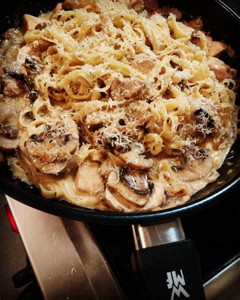 Homemade Tagliatelle With Chicken And Mushrooms In A Cream Sauce