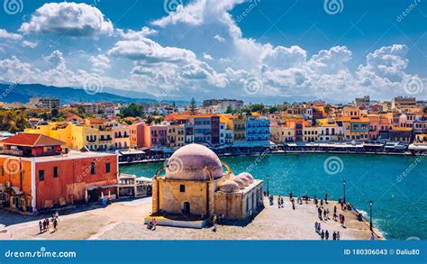 Mosque In The Old Venetian Harbor Of Chania Town On Crete Island