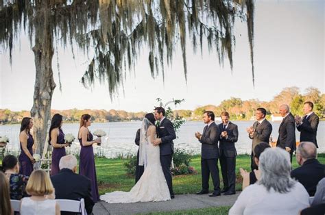 First Kiss As Husband And Wife Overlooking Lake Osceola At The Polasek