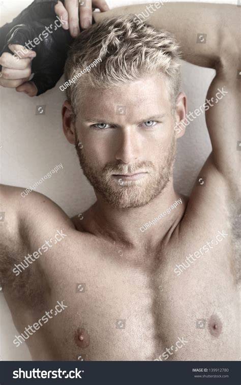 Highly Detailed Fashion Portrait Of A Sexy Muscular Shirtless Male Model Stock Photo