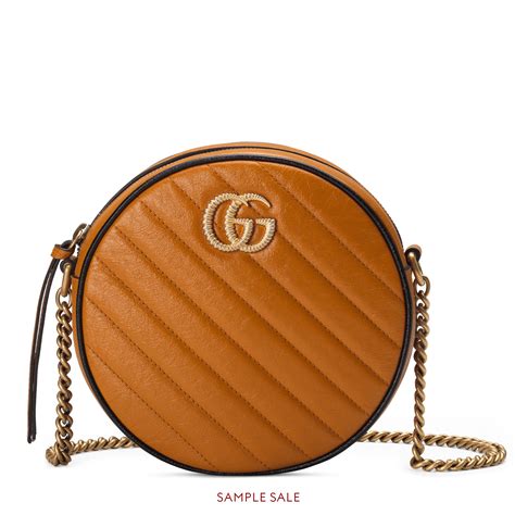 Gucci Gg Marmont Mini Round Crossbody Bag In Cognac Leather Modesens