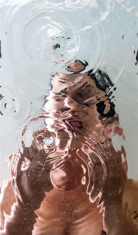 Woman Hashing Her Face In Water Point Of View By Sky Blue Creative