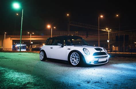 Modish White Mini Cooper Fitted With Front Bumper And Fog Lights White