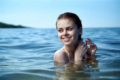 Beautiful Young Woman Is Resting On The Sea Ocean Beachlet Sun