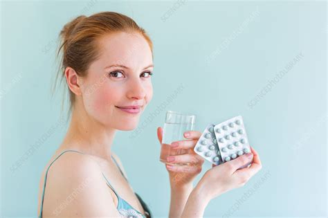 Woman Taking Medicines Stock Image C035 0118 Science Photo Library