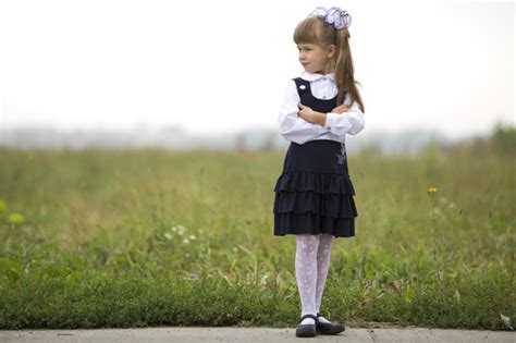 Premium Photo Full Length Portrait Of Cute Adorable Serious Thoughtful First Grader Girl In