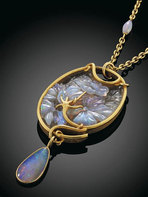 An Art Nouveau Opal And Glass Gold Mounted Pendant By Lalique Christies