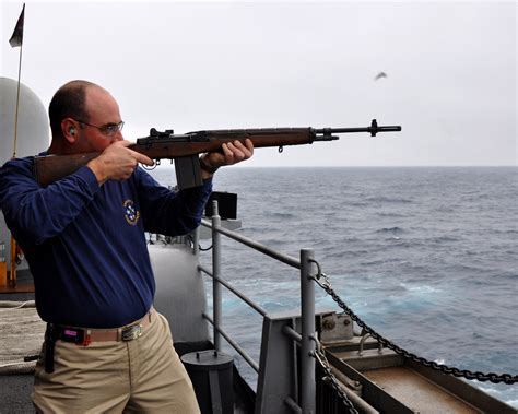 Fileus Navy 100904 N 2811a 469 Capt John Ring Fires An M14 Rifle