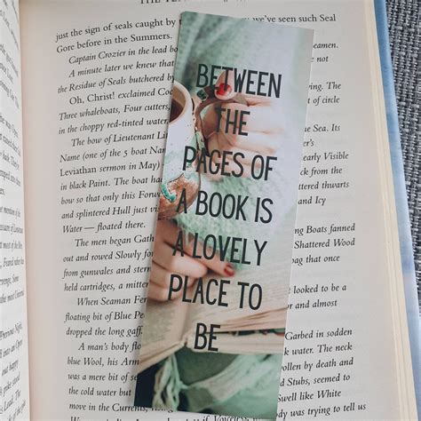 between the pages of a book is a lovely place bookmark etsy