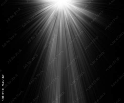 Abstract Beautiful Rays Of Light On Black Background Stock Photo