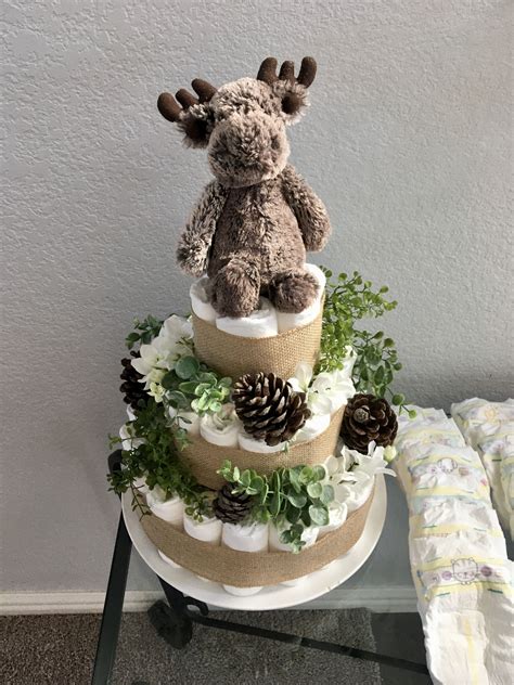 Create a diaper cake for the baby shower. Woodland inspired diaper cake | Diy diaper cake, Elephant ...