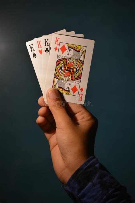 Hand Holding All Kings Of Playing Card Editorial Stock Image Image